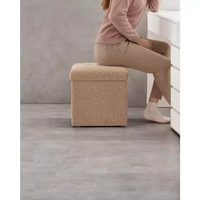 Pouffe pliant avec rangement intégré