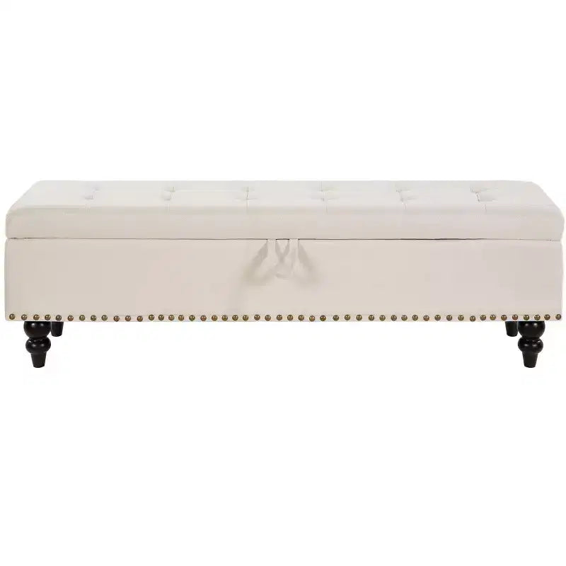 Pouffe de rangement avec surface capitonnée et embellissements cloutés