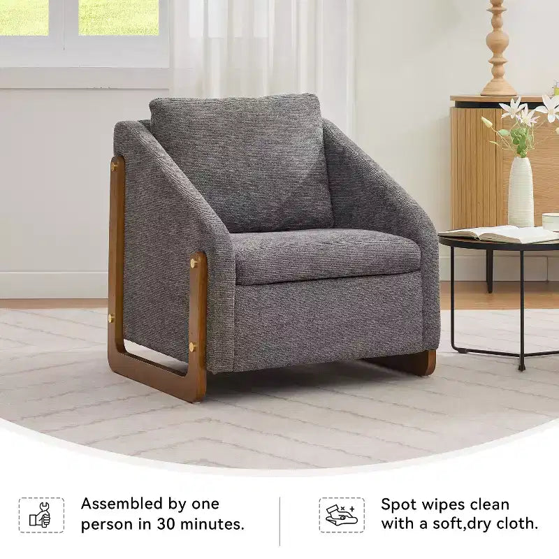 Fauteuil de salon moderne avec assise et dossier garnis de chenille.