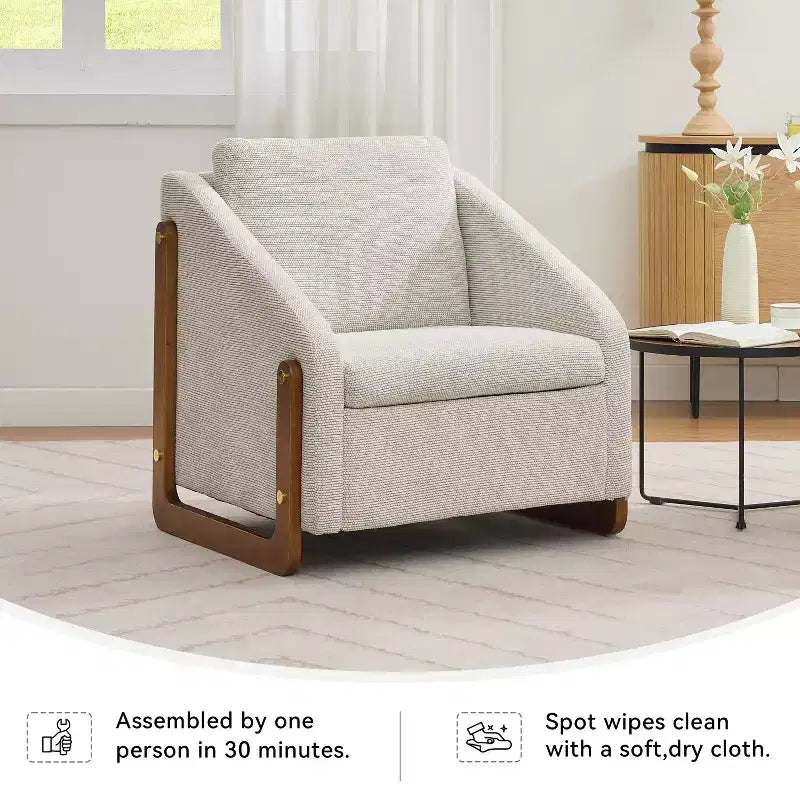 Fauteuil de salon moderne avec assise et dossier garnis de chenille.
