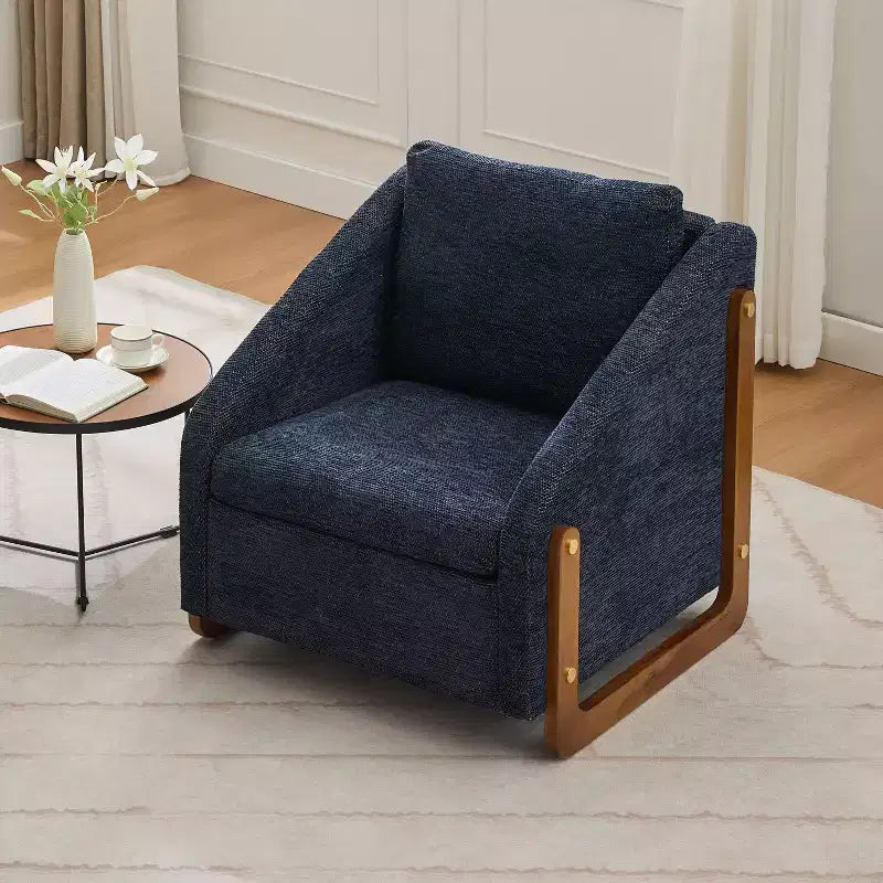 Fauteuil de salon moderne avec assise et dossier garnis de chenille.