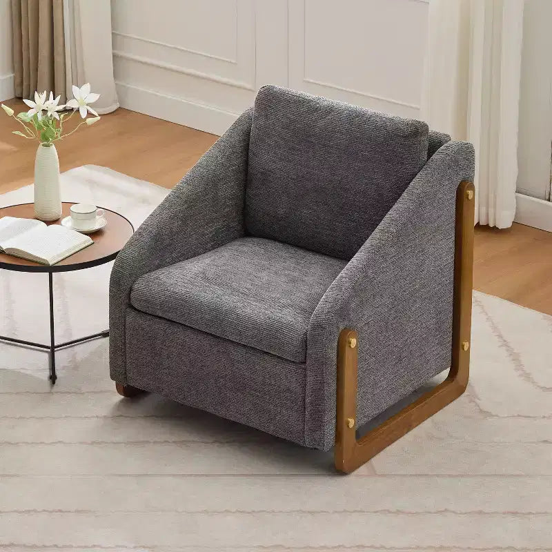 Fauteuil de salon moderne avec assise et dossier garnis de chenille.